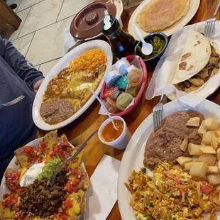 Migas plate, cheese enchilada plate and the nachos. All so yummy