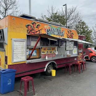 a food truck parked in a parking lot