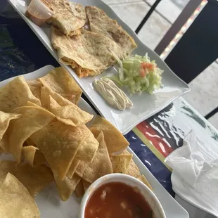 Chicken quesadilla and chips and salsa (side)