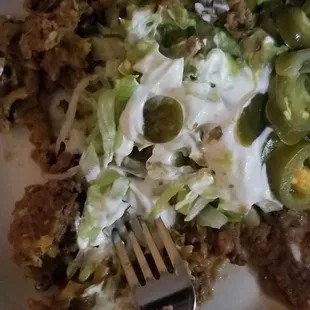 Nachos that were sent back and brought out again. I think they might have burnt a little so we wouldn&apos;t re send back for staleness