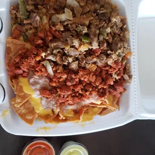 The nachos are awesome. Half pastor, half carne asada.