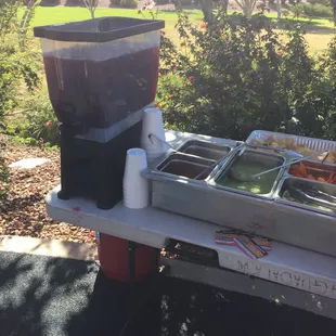 Drink and condiments setup.