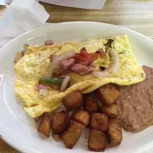 Omelet, refries beans, and papas (painted rocks)