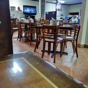 Inside restaurant. They also have 4 seater boothes along the walls