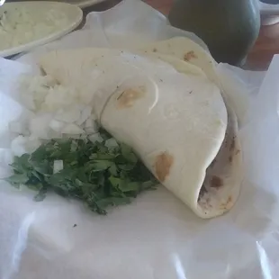 Barbacoa taco! It's really good and meaty.