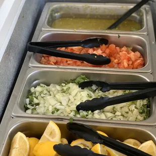 Dress your tacos with these toppings, located inside the cooler