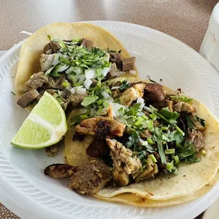 Carnitas taco and beef tongue taco