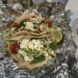 Chicken tacos on corn tortillas