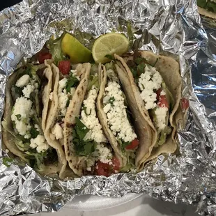 Asada tacos on corn tortillas
