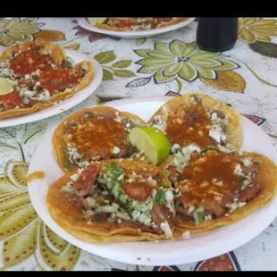 three plates of mexican food