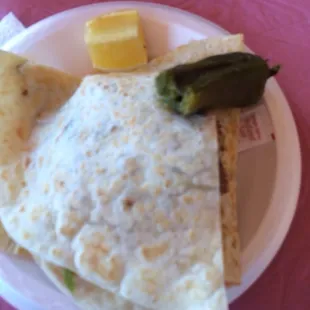 a plate of quesadilla and cheese