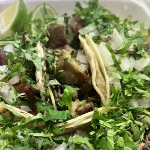 Carnitas with an odd tinted sheen, typically when meat is reheated.