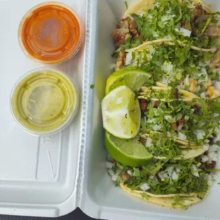 4 tacos (pollo, carnitas, al pastor, and Asada)