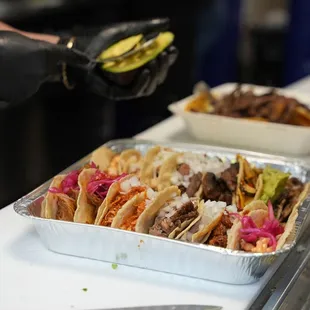 They sell a tray of tacos for larger parties