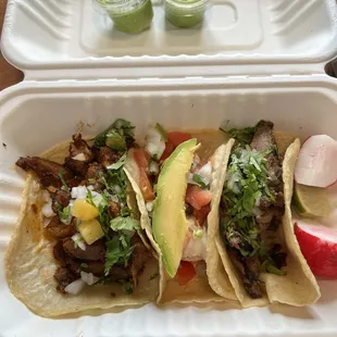 Steak, shrimp, pastor tacos