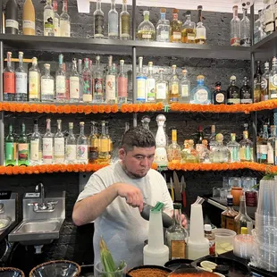 a man making a taqueria