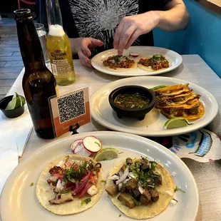 Octopus, lengua, birria, and chorizo tacos