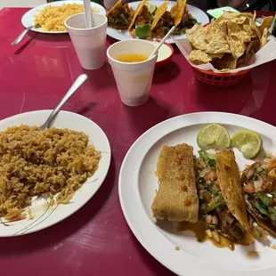 Birria tacos, tamale and rice