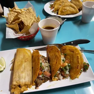 Birria tacos and tamale