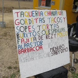 a sign for taqueria