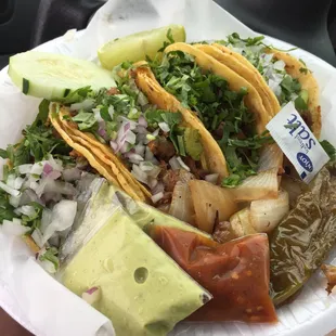 Carne Asada &amp; Al Pastor corn tacos.