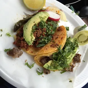 Left- caphachenga (maybe spelled wrong), right- fajita both no onions, with avocado