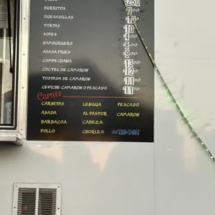 a menu on a food truck