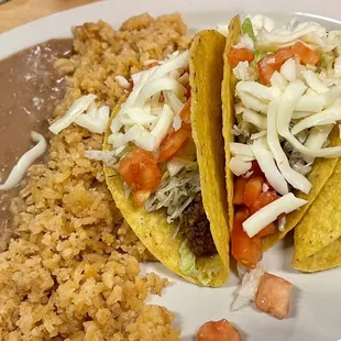 Tacos, refried beans and rice
