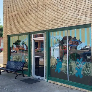 a bench outside a store