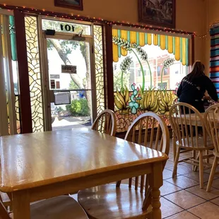 a woman sitting at a table