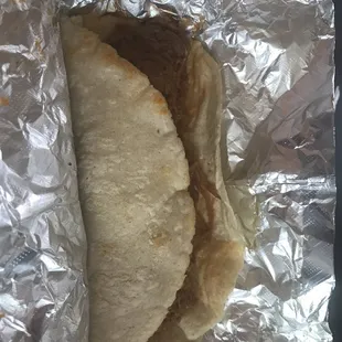Carne desebrada in a homemade corn tortilla