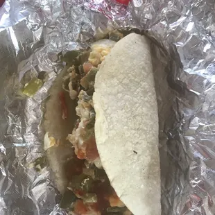 Nopal con huevo in a homemade corn tortilla