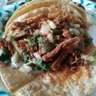 Barbacoa tacos. My fav. Must have but they run out fast!