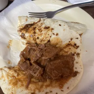 I took a bite and really good Guisada tacos