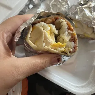 Breakfast burrito. Bacon, cheese, egg, and potatoes
