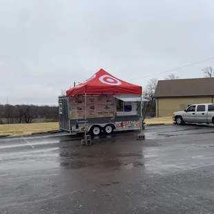 Food truck located in parking lot near church. Right off I-35 and N Brighton. Visible from the road. Walk up or drive-thru tent.