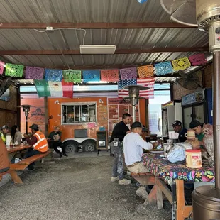 Covered dining area and food truck