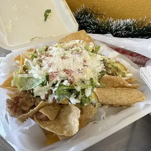 "To-Go" Nachos... inferior to the "For-Here" nachos sadly. ‍
