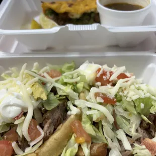 Two sopes with carnitas, loaded