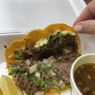 Inside the quesa birria taco - cheese on both sides of the tortilla and filled with meat, really good