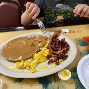 Big pancakes, doubtful he'll finish