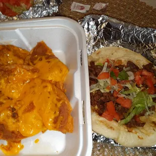 Order of bean and cheese nachos to go &amp; carne Asada taco.