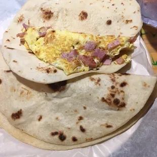 a tortilla with eggs and ham