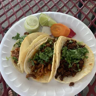 Al Pastor and Chorizo tacos without onion topping.