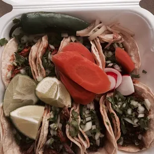 Eight tacos, various flavors. They&apos;re small, so order at least 4-5 if you&apos;re making a meal of it.