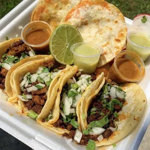 Al pastor and chorizo tacos and mulitas