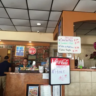 a restaurant counter with menus