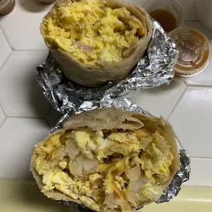 Huge breakfast burritos: Potato (Fried) and eggs &amp; a Spam and Egg