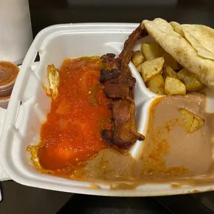 Huevos Rancheros Breakfast Plate. Recently discovered how much I enjoy their breakfasts. The right way to start the day!