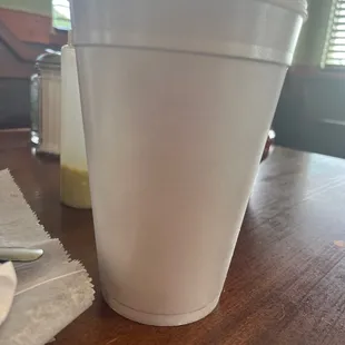 a plastic cup on a table